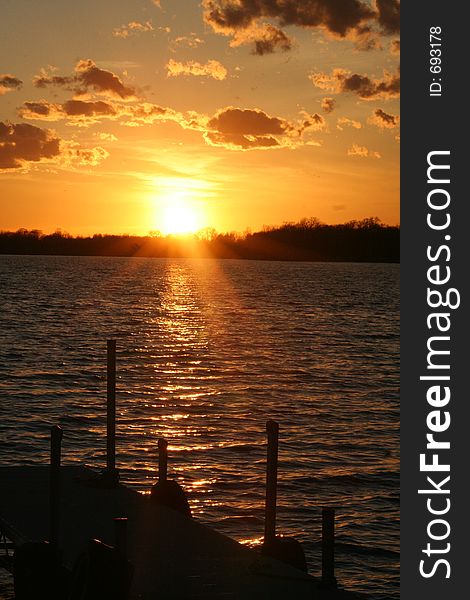 A view of a beautiful sunset from a dock. A view of a beautiful sunset from a dock.