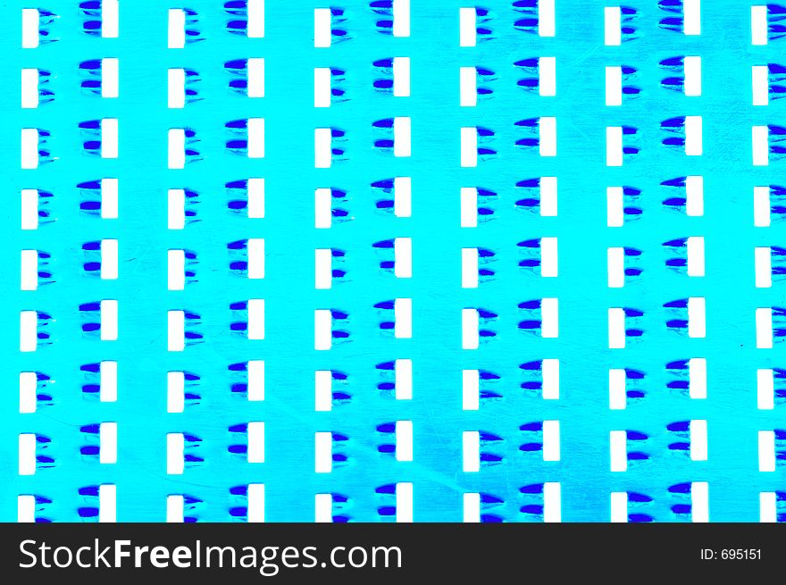 Cantle of a cheese grater in psychodelic colors
