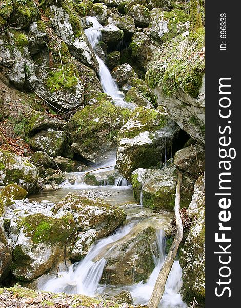 Small rivulet, stones and moss