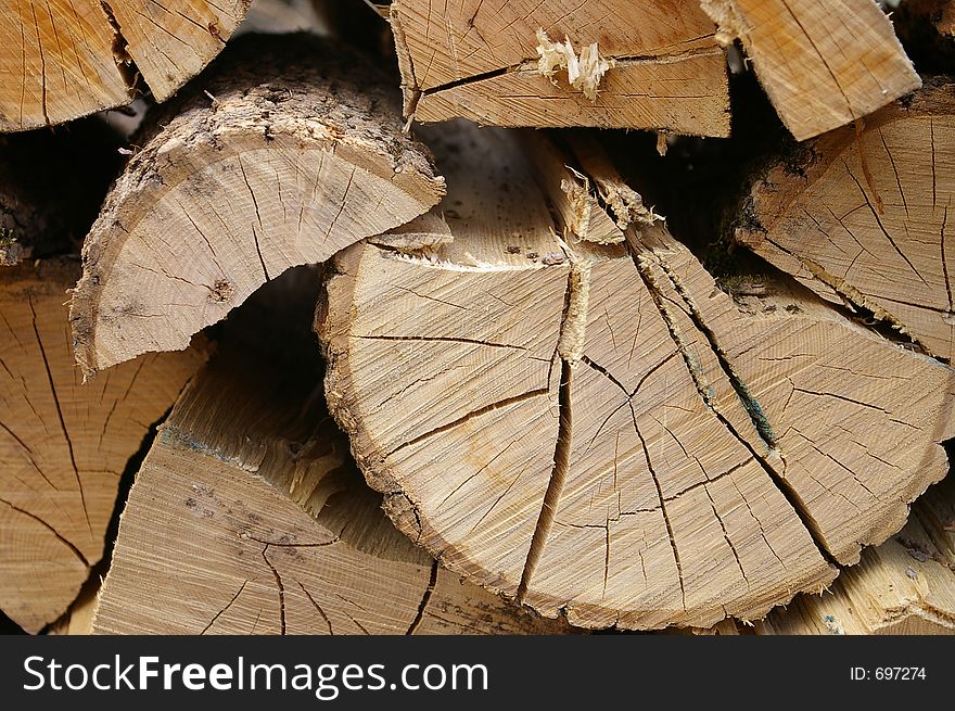 A wood pile of cut logs