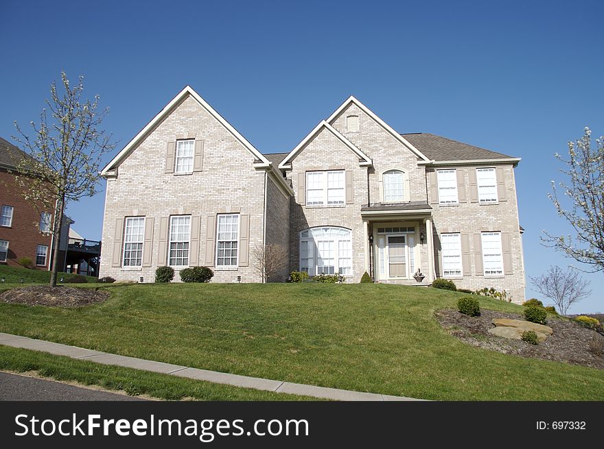 Luxury Home with Blue Sky Background