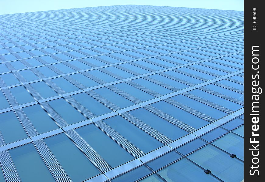 Glass fron of a skycraper. Glass fron of a skycraper