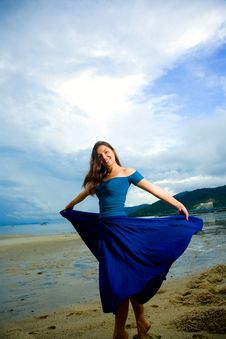 Young Eurasian Woman At The Sunset Beach Stock Photos Young Eurasian Woman At The Sunset Beach Stock Photos