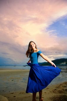 Young Eurasian Woman At The Sunset Beach Stock Images Young Eurasian Woman At The Sunset Beach Stock Images