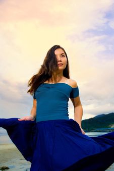 Young Eurasian Woman At The Sunset Beach Stock Images Young Eurasian Woman At The Sunset Beach Stock Images