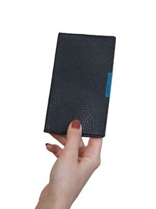 Hand With A Notebook Royalty Free Stock Image