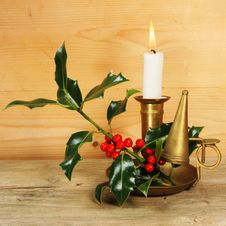 Candle And Holly Stock Photo