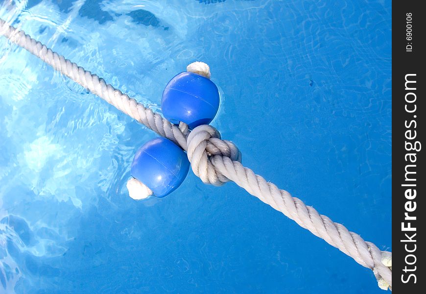 Blue buoy in the swimming pool