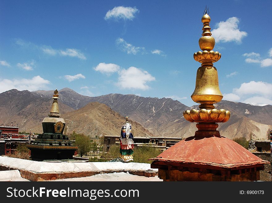 The golden summit of a lamasery named Sangyesi in Tibet,China