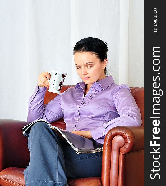 Young girl drinking coffee