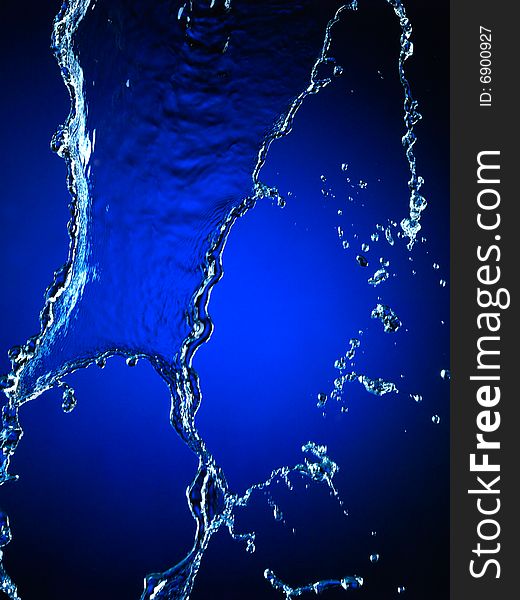 Falling water on blue. Very high resolution. Falling water on blue. Very high resolution.