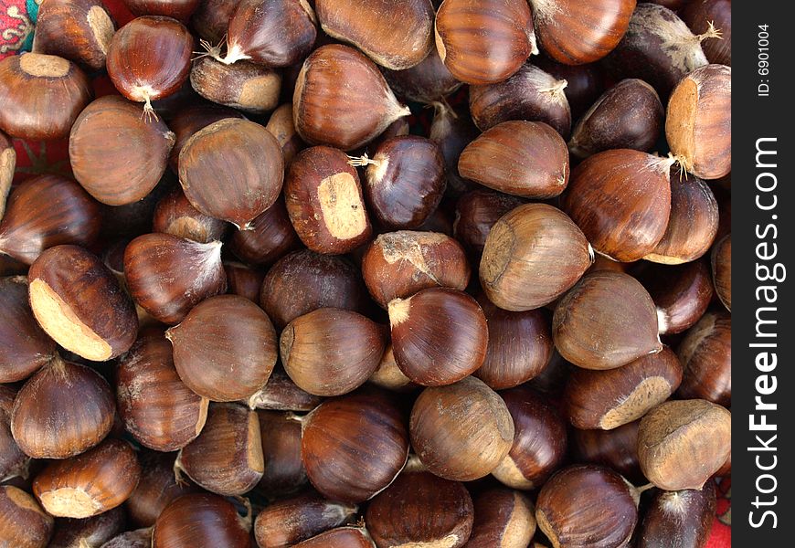 Chestnuts brown background of northern Italy. Chestnuts brown background of northern Italy