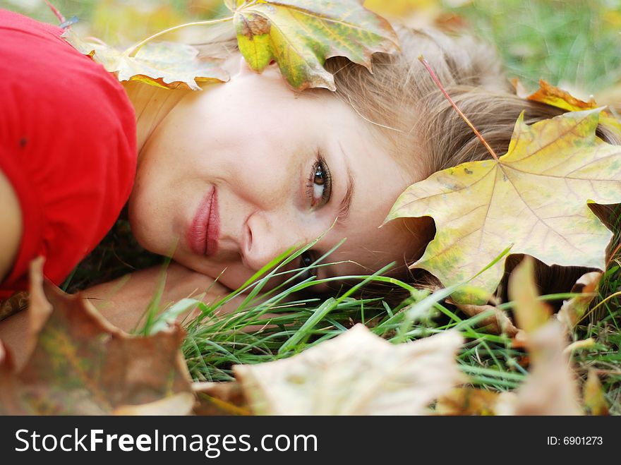 Young Woman And Leaves