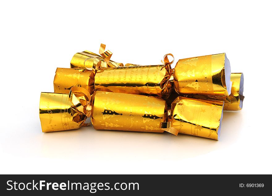 Shot of some gold coloured christmas crackers