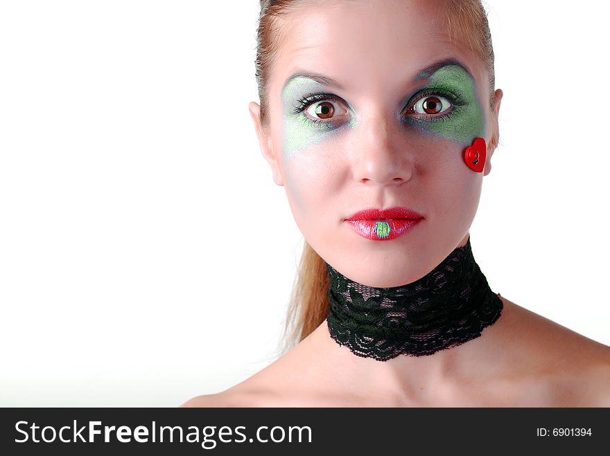 Portrait of a beautiful woman with green eyeshadow and patch. Portrait of a beautiful woman with green eyeshadow and patch