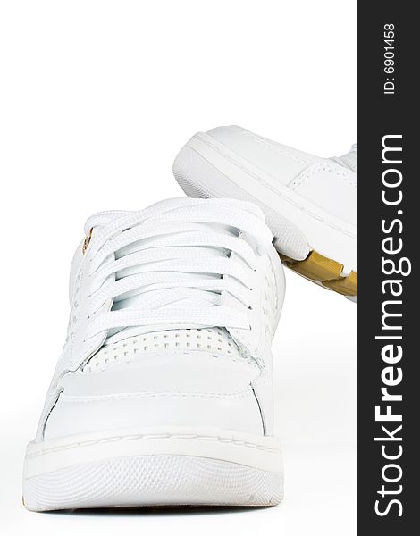 White jogging shoes on a white background. White jogging shoes on a white background