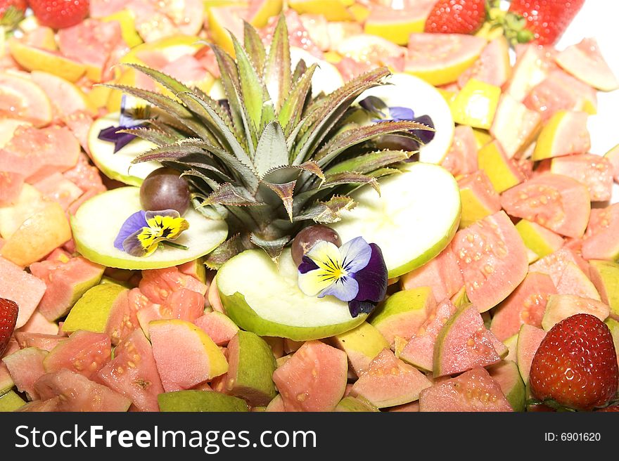 Fruit Salad display with guava, apple and strawberries