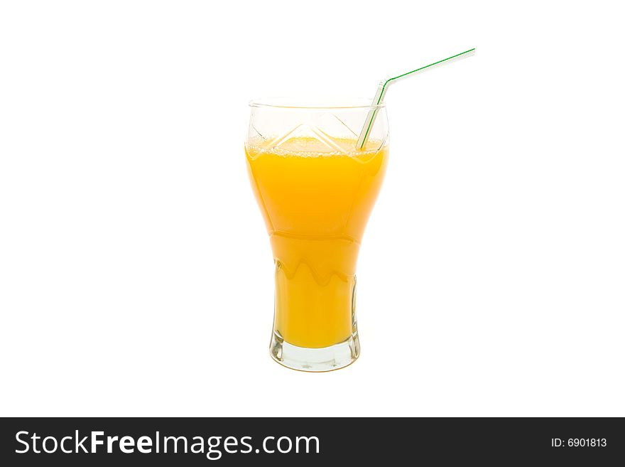 Glass of orange juice with straw on white