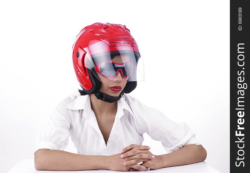 A sexy asian biker girl with a red helmet. A sexy asian biker girl with a red helmet