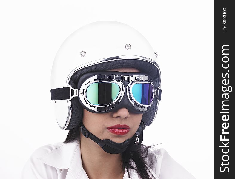 A pretty asian biker girl wearing a white helmet. A pretty asian biker girl wearing a white helmet