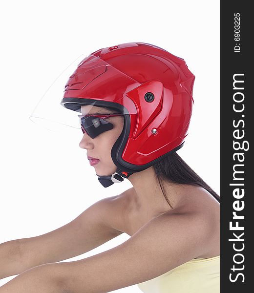 Asian biker girl with a red helmet