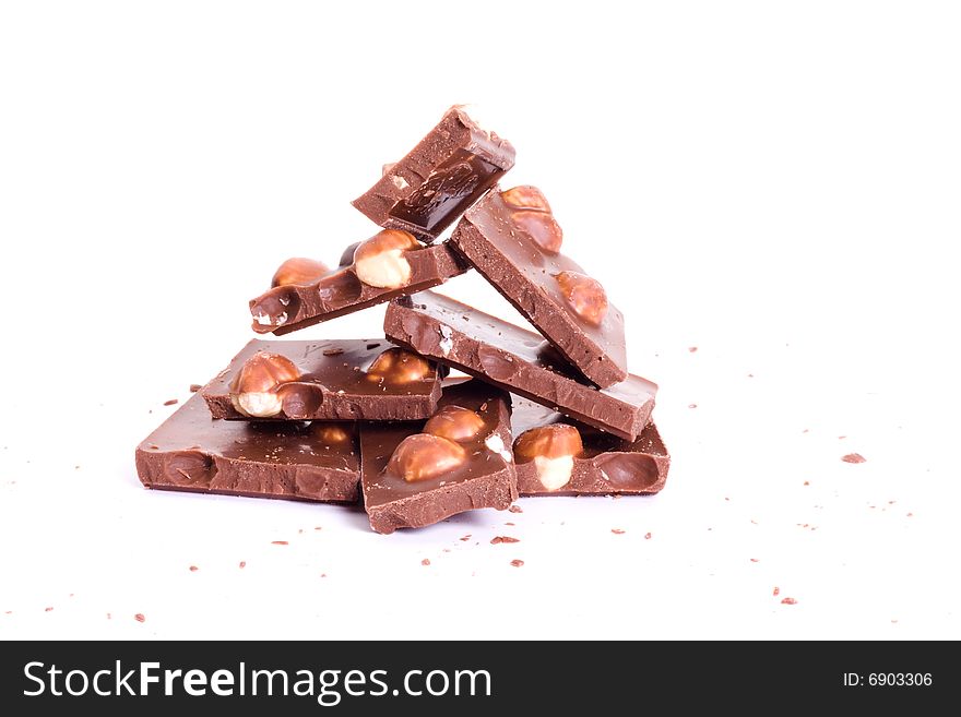 Chocolate tower with crumb isolated on white