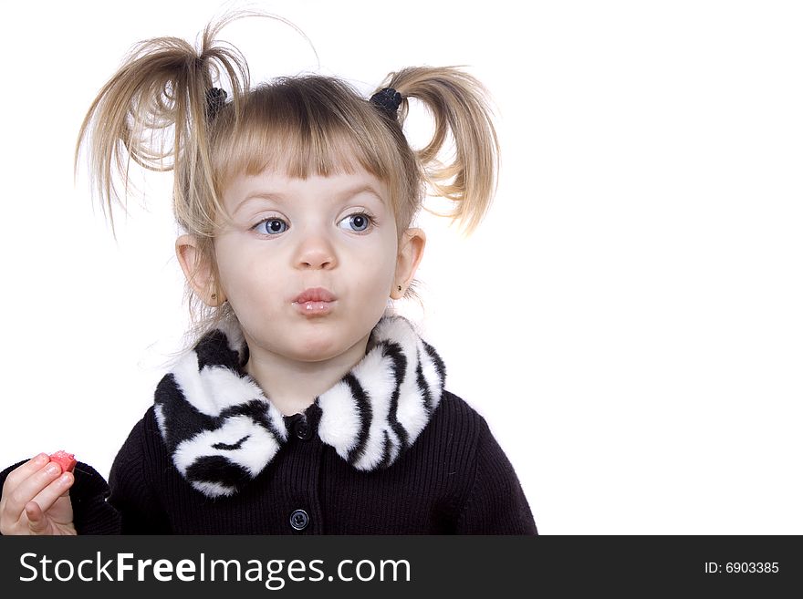 A little blond girl making silly faces. A little blond girl making silly faces