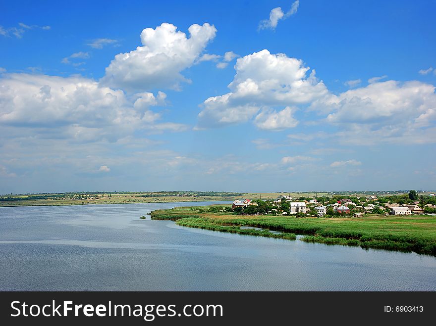 River and blue sky scenic background. River and blue sky scenic background