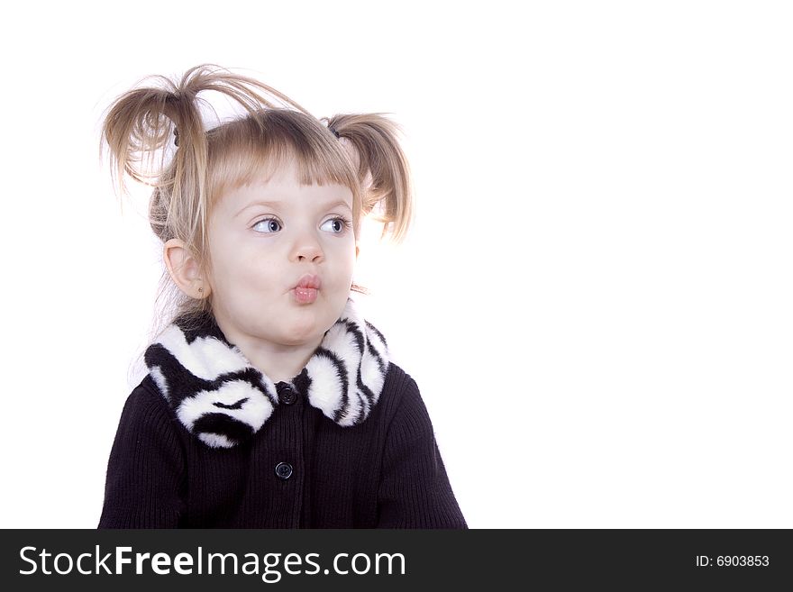 A little blond girl making silly faces. A little blond girl making silly faces