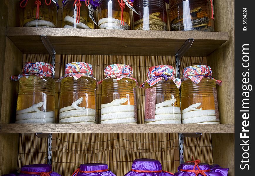 Awamori bottles with snake inside