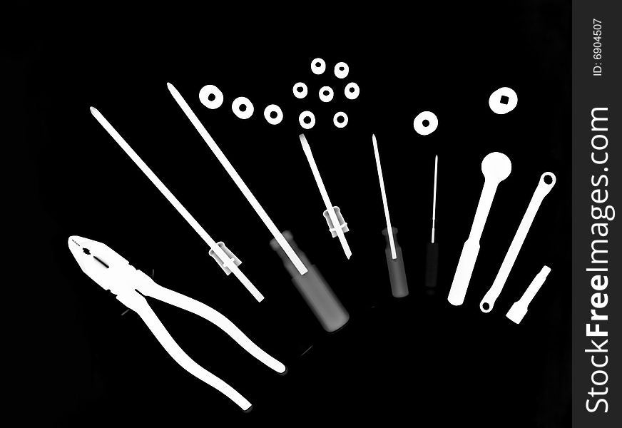 X-ray picture :set of tools on black background