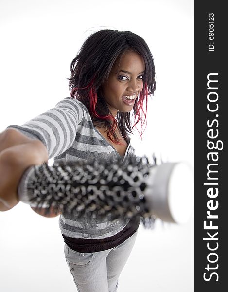 Girl with hair brush with white background