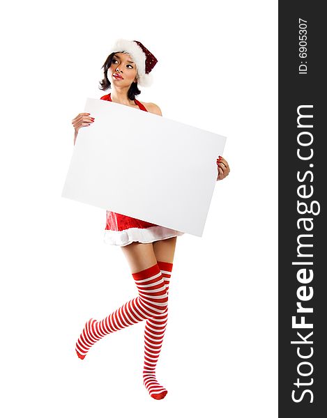 Smiling christmas woman isolated on white background with a white paper