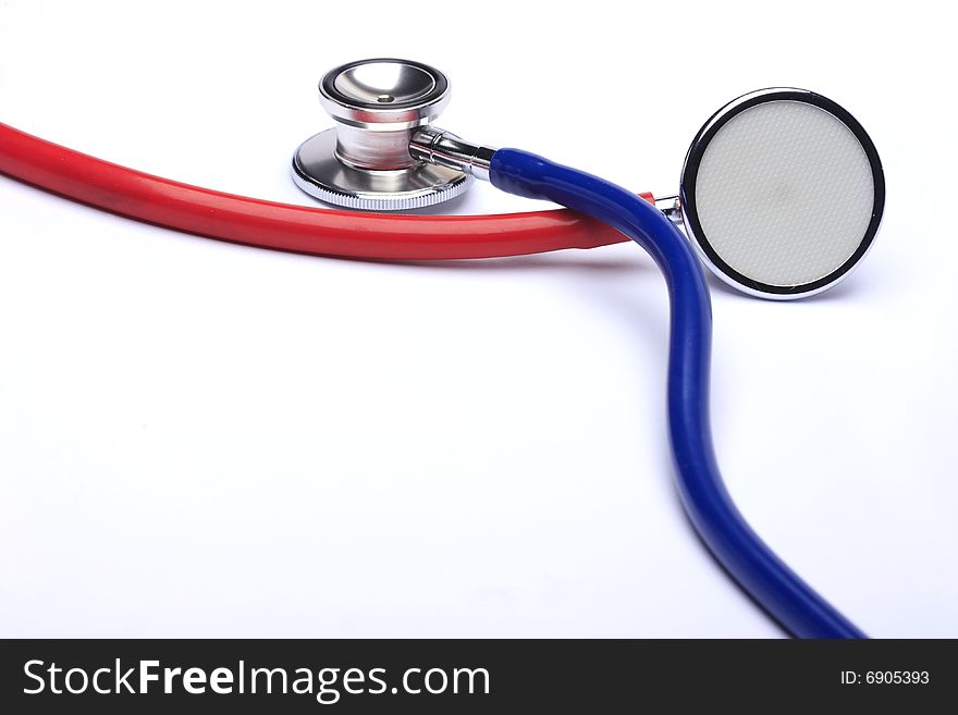 Red and blue stethoscopes isolated in white background