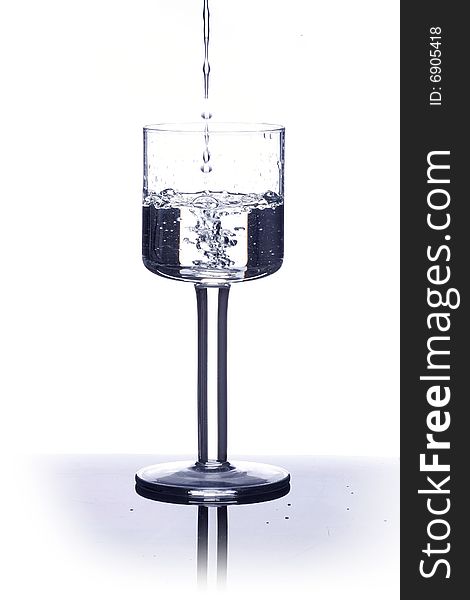 Isolated glass of water in white background