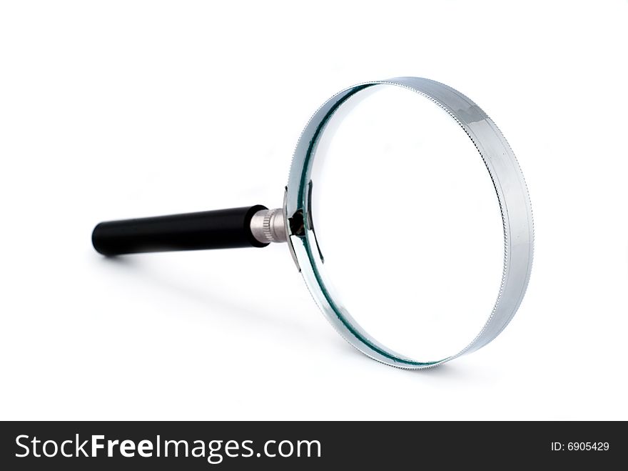Magnifying glass with a black handle on a white background. Magnifying glass with a black handle on a white background