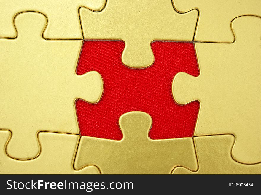 Gold puzzle for background. business concept