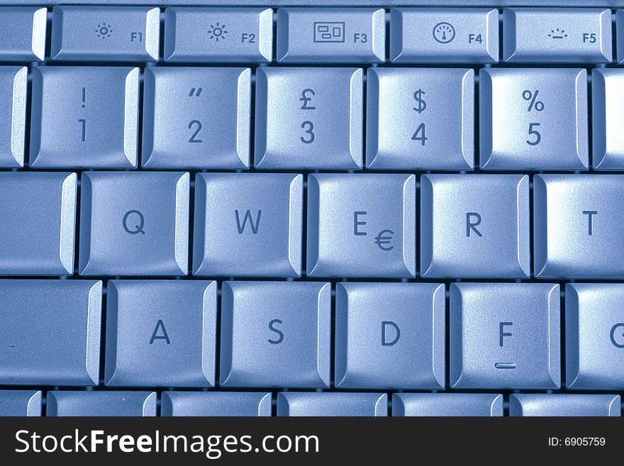 Close-up of notebook's keyboard, details of technology