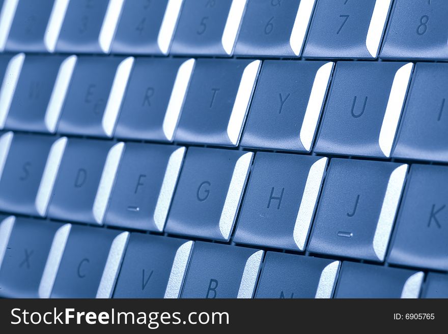 Close-up of notebook's keyboard, details of technology