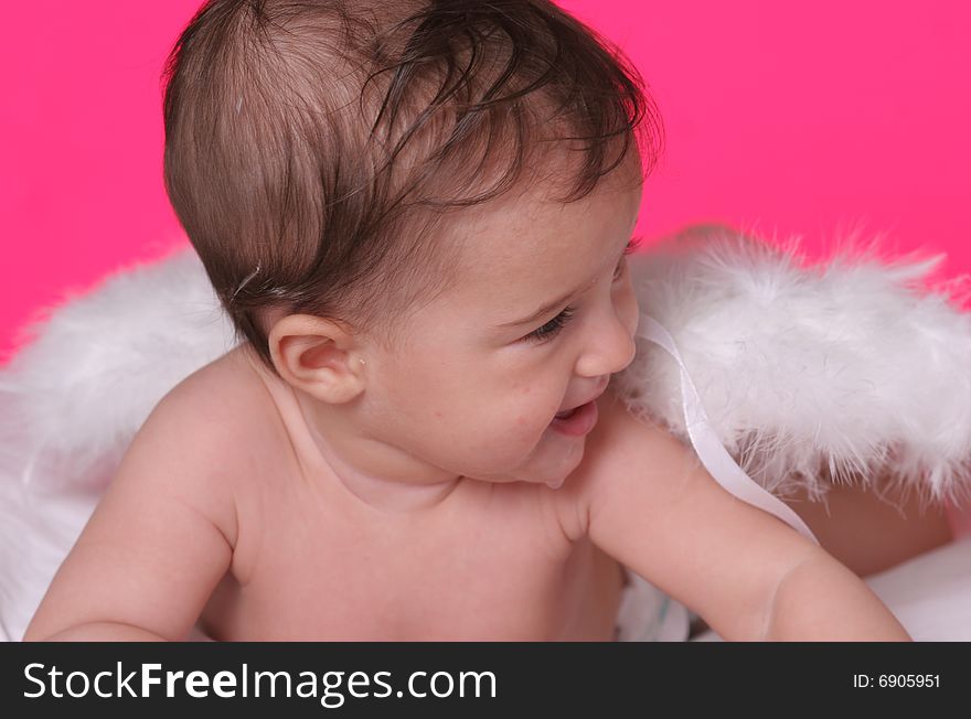 Cute baby girl withangel wings on pink background. Cute baby girl withangel wings on pink background