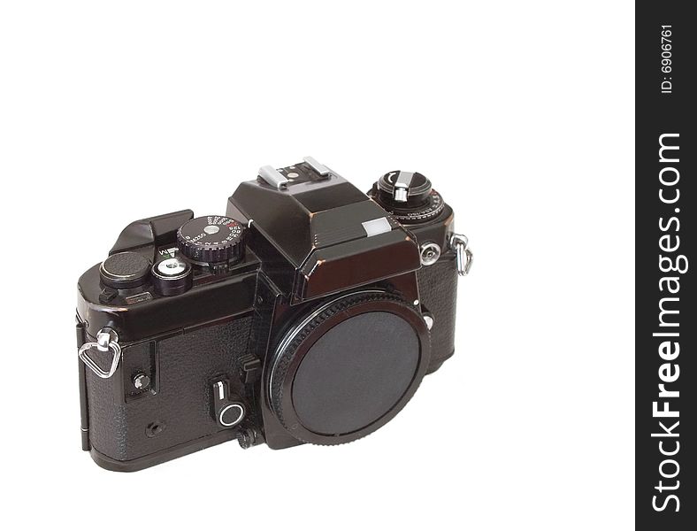 Vintage 1970's 35mm SLR camera body isolated on white. Vintage 1970's 35mm SLR camera body isolated on white