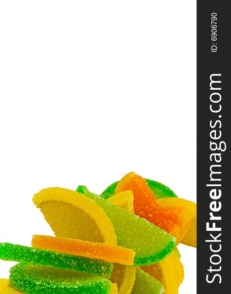 Colorful fruit candies over white background