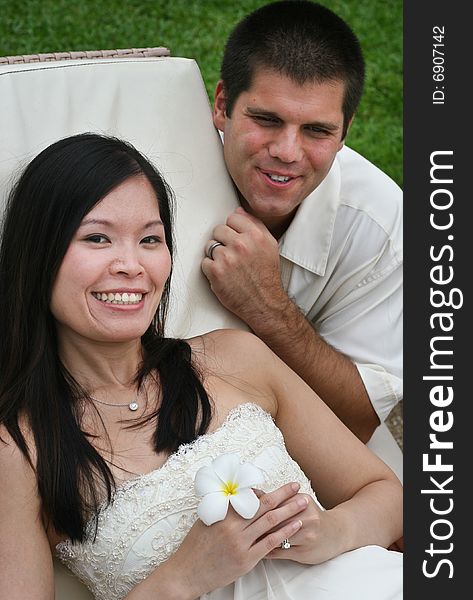 Happy bride and groom on their wedding day. Happy bride and groom on their wedding day.