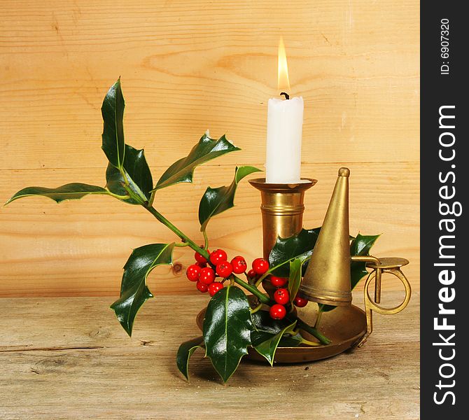 Candle and holly