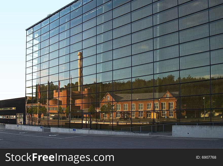 Reflection of an urban scenery from a glass wall structure. Reflection of an urban scenery from a glass wall structure