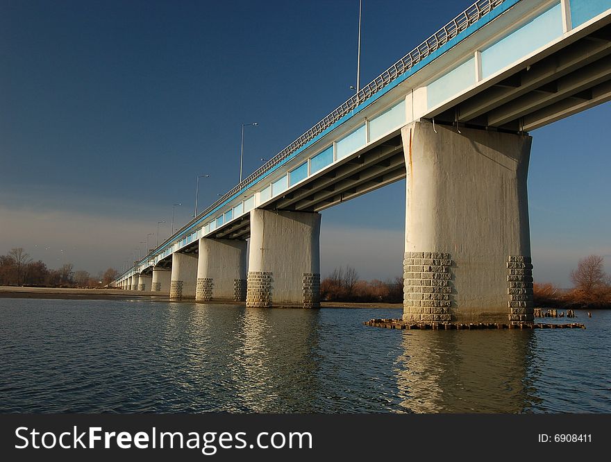 Bridge on a river with nice sunny sky