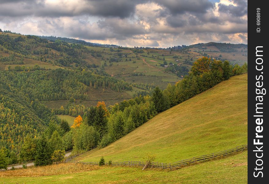 Autumn mountain landscape in a cloudy day.Location:Apuseni Mountains,Romania.(HDR image). Autumn mountain landscape in a cloudy day.Location:Apuseni Mountains,Romania.(HDR image)