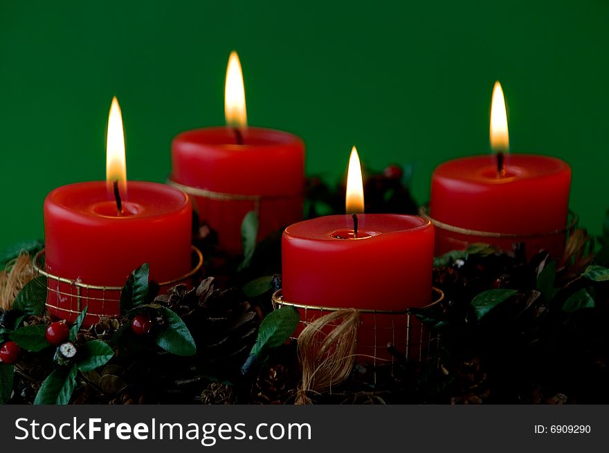 Christmas candles arrangement in colorful festive themes