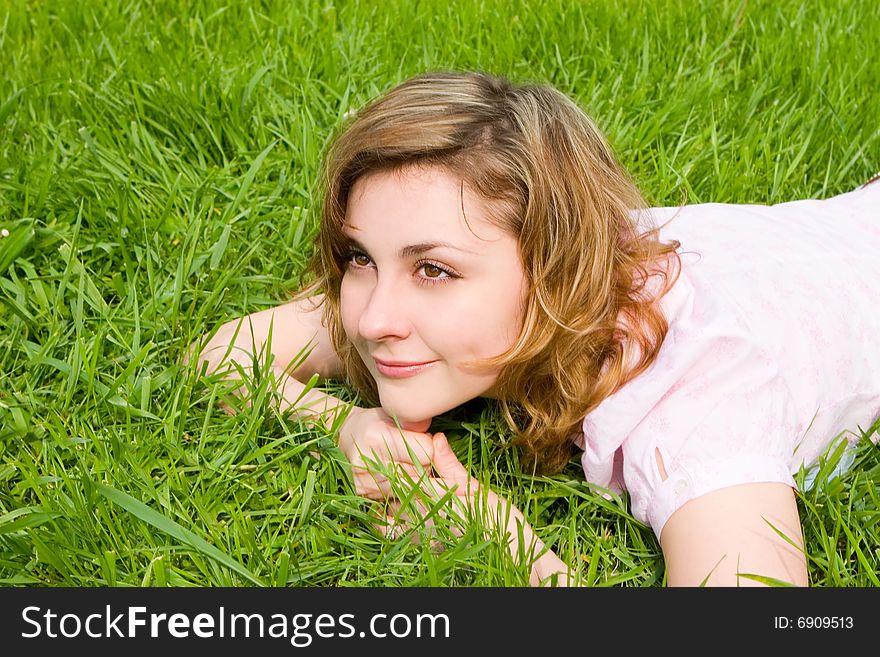 Sweet woman rest on the grass