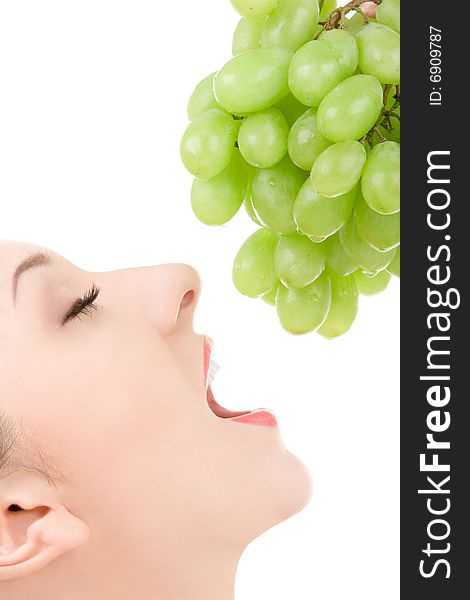 Pretty woman with green grape